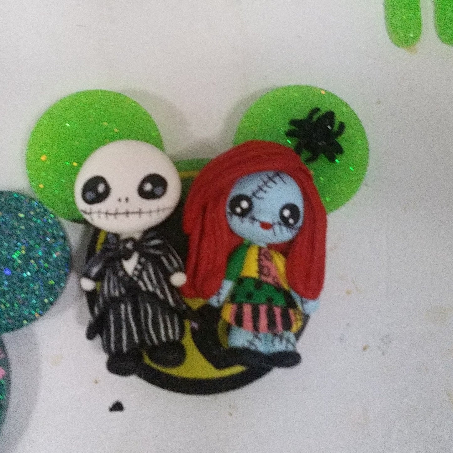 small jack and sally with gift and pumpkin glow in the dark